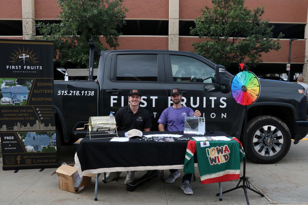 First Fruits team in front of company car